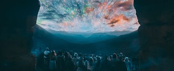 An screenshot of the show Andor, as many people stand watching a colourful space event