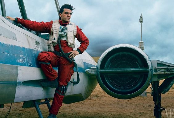 An screenshot of the movie Star Wars: The Force Awakens, as Poe Dameron stands next to his spaceship