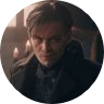 An image of Kaz Brekker (Shadow and Bone) looking sneaky